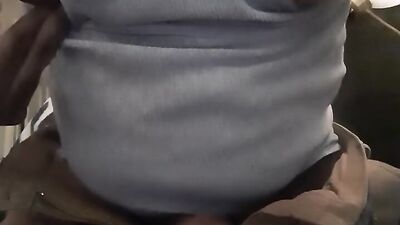 Horny black hunk plays with his nipples and jerks off