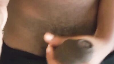 Ebony stud teases with his huge black cock and jerks off