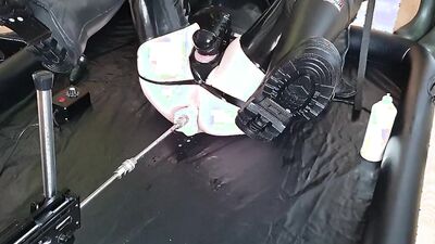 Perverted dude in a leather outfit drills his ass with a fucking machine