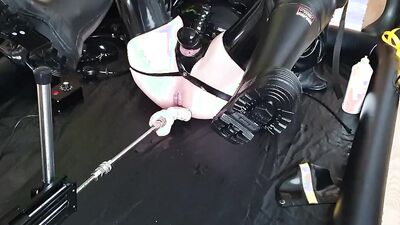 Perverted dude in a leather outfit drills his ass with a fucking machine