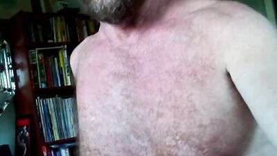 Hairy older dude strokes his hard cock and teases with his ass