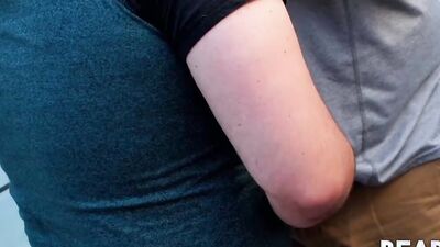 Cute guy on his knees sucks a chubby dude off