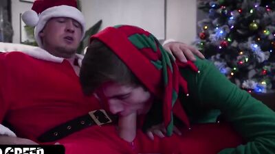 Cute twink gives Santa a blowjob and takes a pounding