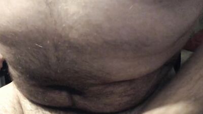 Hung and hairy amateur teases with his cock and strokes it