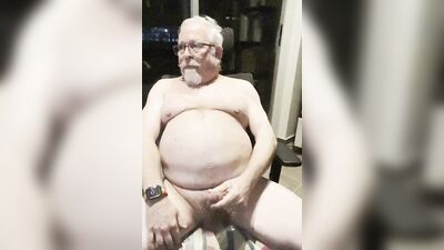 Chubby older guy with a big cock jerks off solo