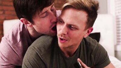 Dashing young gay guys enjoy a steamy foreplay before fucking