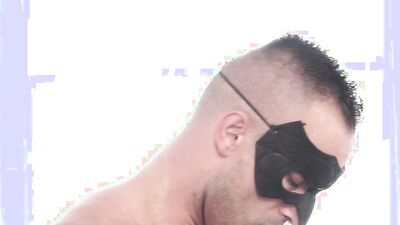 Fit jock with a mask sucked off by a naughty twink