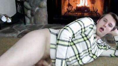 Naughty amateur takes his pants off and masturbates by the fireside