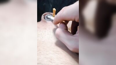Naughty dude uses his micropenis as an ashtray while smoking