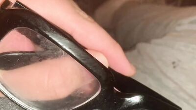 Perverted dude jerks off and cums on his thick glasses
