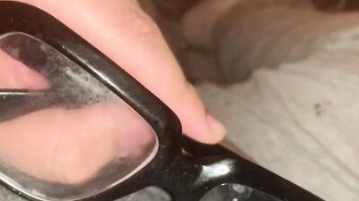 Perverted dude jerks off and cums on his thick glasses