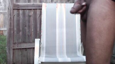 Attractive black hunk lubes his big cock and jerks off