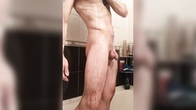 Hairy amateur with a ripped body jerks off in the shower