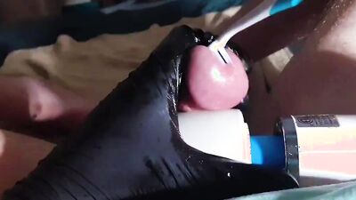 Perverted dude inserts a toothbrush in his big hard cock