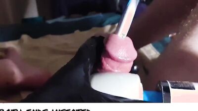 Perverted dude inserts a toothbrush in his big hard cock