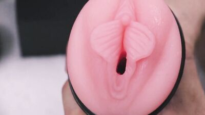Horny gay guy fingers his fleshlight and fucks hit passionately