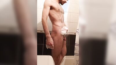 Amateur stud takes a steamy shower and jerks off solo