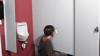 Cute twink blows his stepdad through a gloryhole before fucking