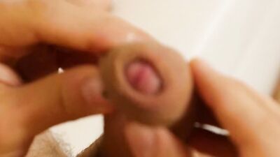 Hot blond twink teases with his big cock and strokes it