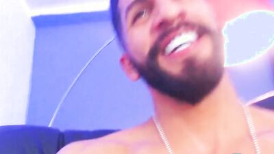 Striking dude with muscles and a beard jerks off solo