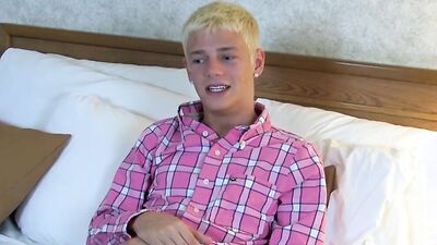 Cute and tiny blond twink strips after an interview and jerks off