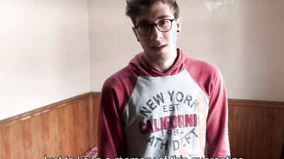 Slim twink with nerdy glasses and a huge cock jerks off