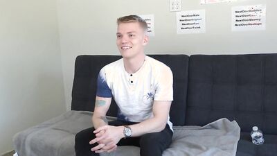 Gorgeous young blonde twink strips naked and strokes his cock