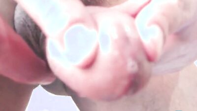 Horny stud uses both hands to tug on his big cock