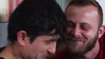 Bearded hunk and a horny stud suck each other off