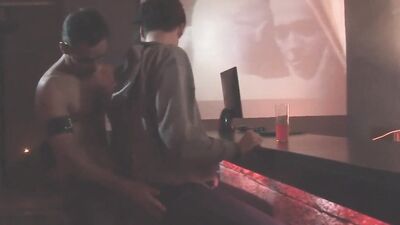 Twink sucks a huge cock in a bar before being analized