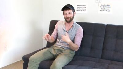 Fit bearded guy takes his fat cock out to masturbate