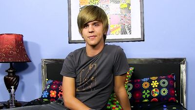 Adorable blond twink strips after an interview and jerks off solo