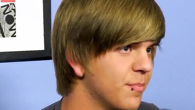 Adorable blond twink strips after an interview and jerks off solo