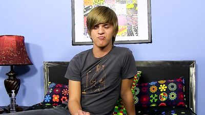 Adorable blond twink strips after an interview and jerks off solo