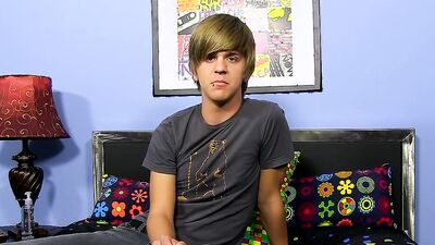 Adorable blond twink strips after an interview and jerks off solo