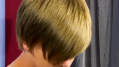 Adorable blond twink strips after an interview and jerks off solo