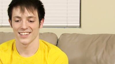 Lovely twink has fun at an interview and jerks off solo