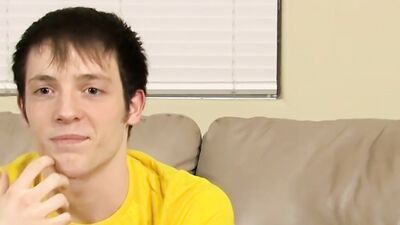 Lovely twink has fun at an interview and jerks off solo
