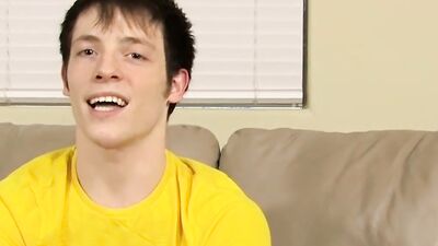 Lovely twink has fun at an interview and jerks off solo