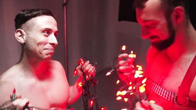 Naughty studs have fun in a BDSM swing and fuck rough