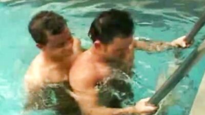 Gay guys suck each other off in a pool and fuck