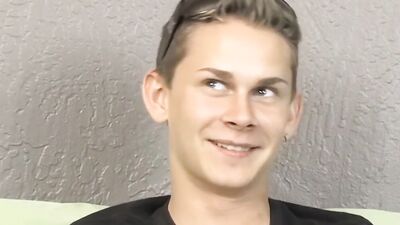 Cute twink has fun at an interview before jerking off