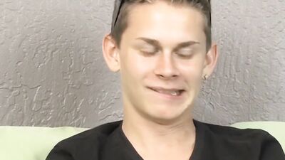 Cute twink has fun at an interview before jerking off