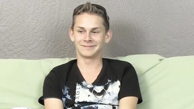 Cute twink has fun at an interview before jerking off