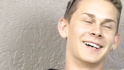 Cute twink has fun at an interview before jerking off