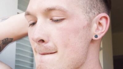 Inked jock deepthroats a rock hard cock and gets rammed
