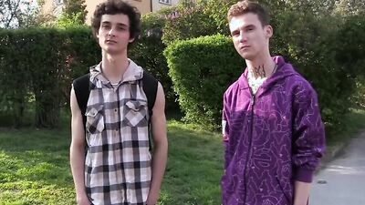 Two slender twinks in colorful shirts suck a man off in a POV threeway