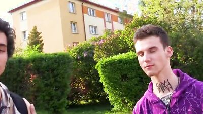 Two slender twinks in colorful shirts suck a man off in a POV threeway