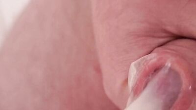 Naughty amateur jerks off and cums multiple times in a condom