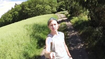 Cute twink films himself in nature before having his dick toyed with